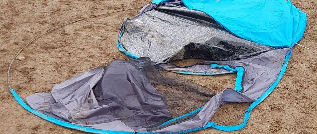 Broken tent at a festival