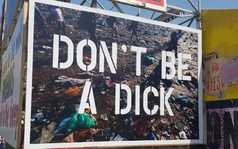 Don't be a Dick billboard at Glastonbury